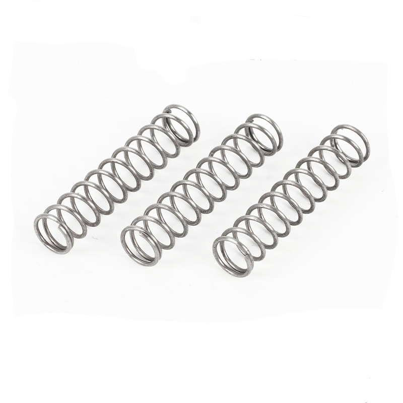 Mola de compressão adaptativamente compressiva